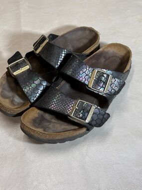Birkenstocks in Iridescent Black Snake-Print Slide Sandals